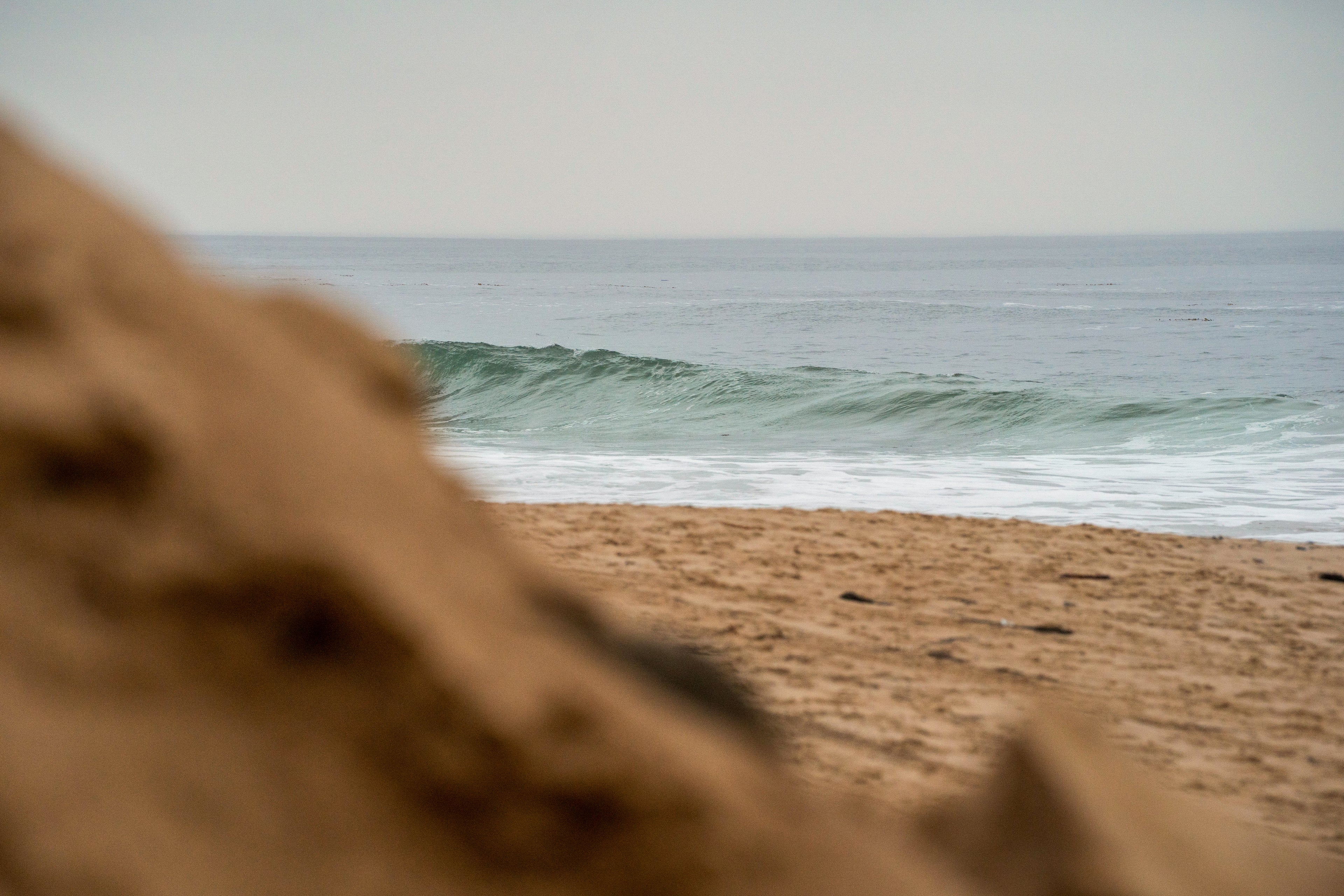 Peekaboo View of a Wave at Crystal Cove State Beach