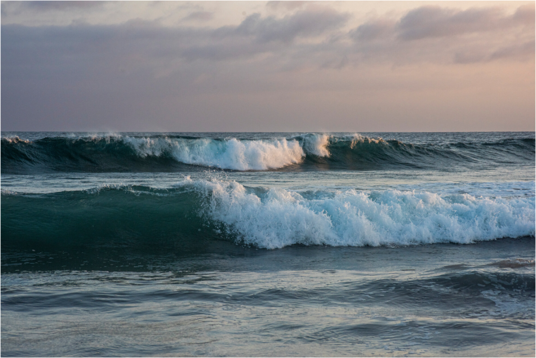 Crashing Waves at Sunset